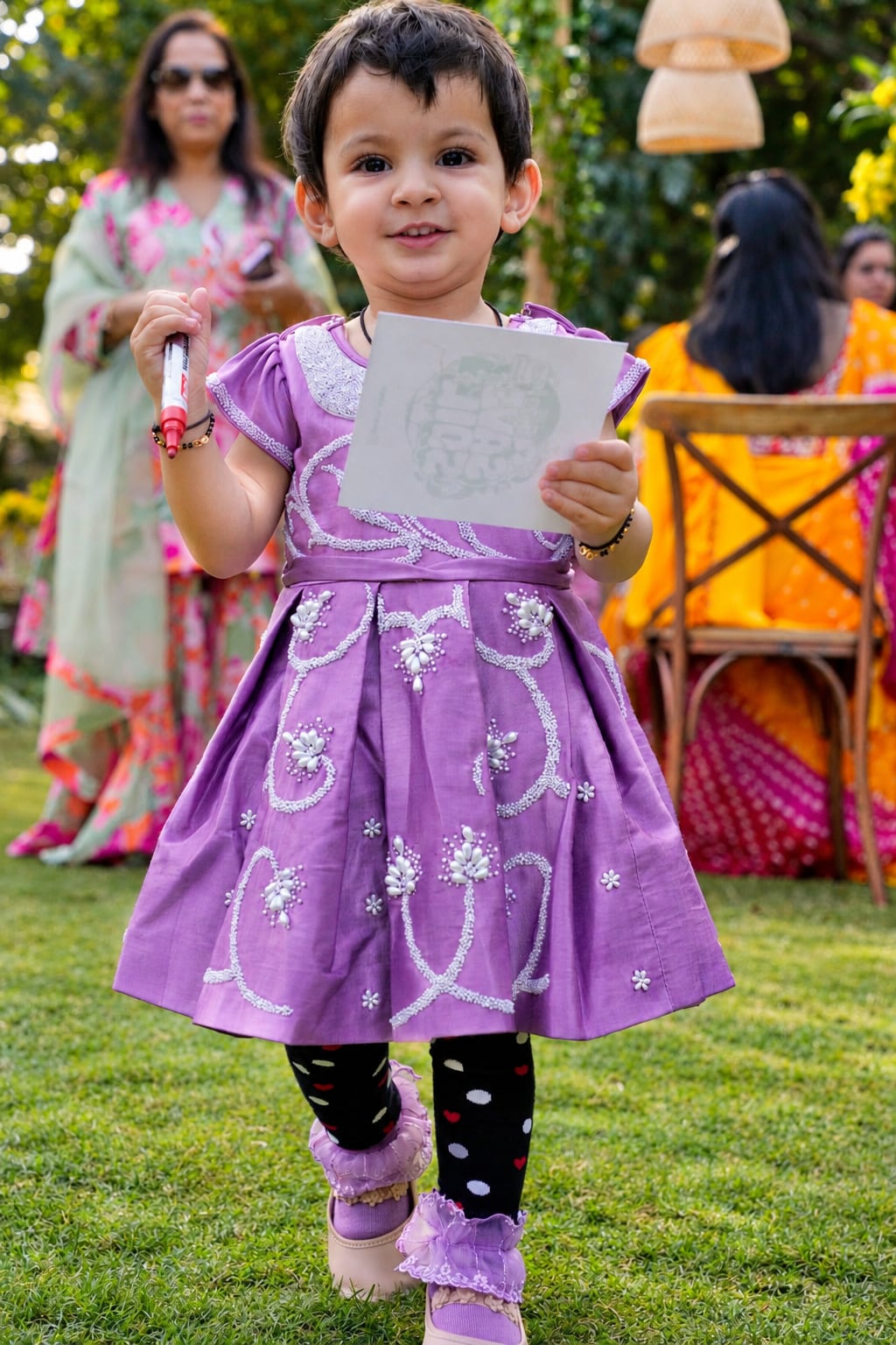 A young doodler with her drawing